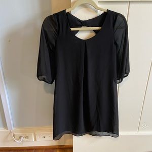 black dress with cute bow design in back